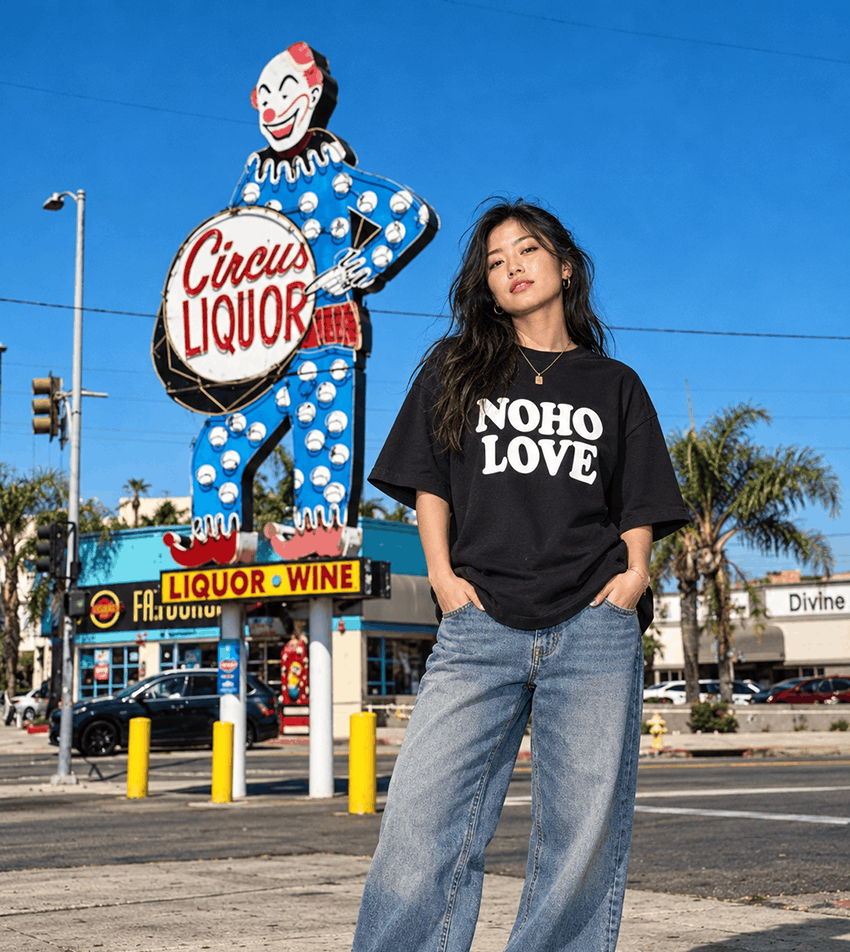 Model wearing a black NOHO LOVE graphic shirt in North Hollywood